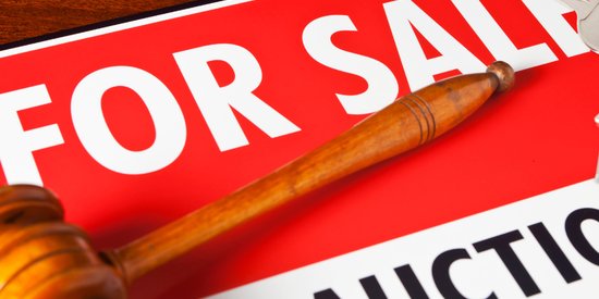 Selling a House at Auction: How It Works, Costs, Pros & Cons